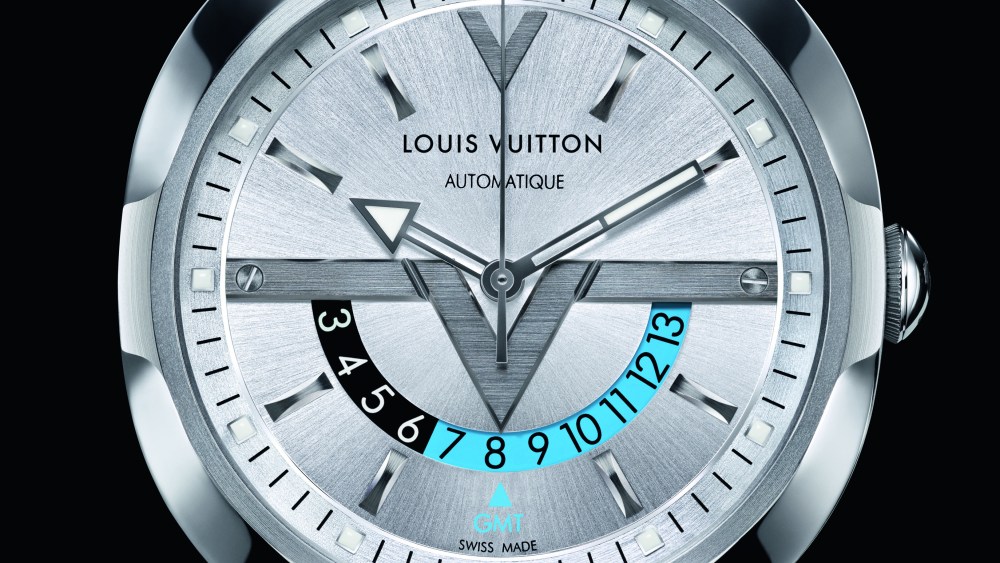 The Louis Vuitton Voyager watch on a leather bracelet