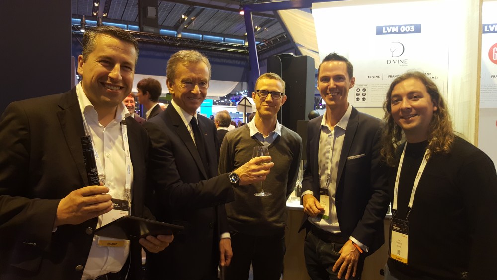 Bernard Arnault and Ian Rogers touring startups at the Viva Technology conference