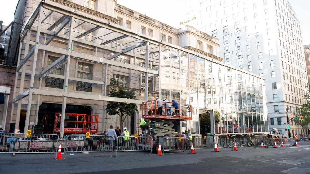 Workers set up the outdoor installation for ralph Lauren’s show on Madison avenue.