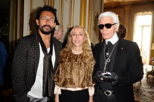 Haider Ackerman, Franca Sozzani and Karl Lagerfeld attend a party celebrating Sozzani being named a Chevalier of the Legion of Honor at the Italian embassy, 2012.