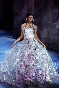 Strapless metallic silver mesh gown with train in the Givenchy Spring/Summer 2000 Couture show in Paris designed by Alexander McQueen