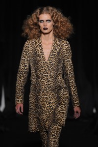 A womenswear model on the runway at Givenchy's spring 2011 menswear show at the Hotel Intercontinental. Designed by Riccardo Tisci.