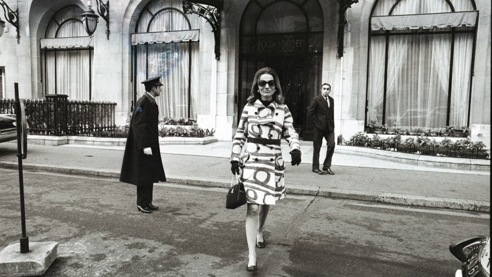 Lee Radziwill in Paris leaves her hotel, "The Plaza Athenee" and walks past Christian Dior boutique.