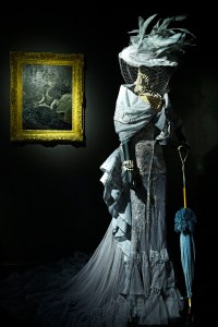 A design by John Galliano alongside a painting by Giovanni Boldini in the Dior exhibition at Les Arts Décoratifs. 
