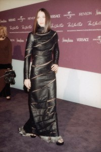 Outtake; Singer and actress Madonna in a leather Jean Paul Gaultier dress at the 9th annual Fire and Ice Ball to benefit the Revlon/UCLA Women's Cancer Research Program at Universal Studios on December 10, 1998 in Los Angeles, California.Article title: "Versace's Fire Brigade"