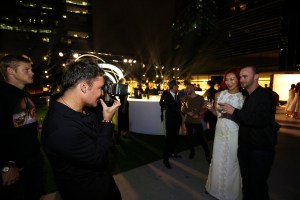 Lachapelle (left) shooting photos at the after party.
