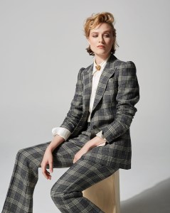 Evan Rachel Wood in ALC’s plaid suit; Ralph Lauren’s cream blouse. Neil Lane brooch.