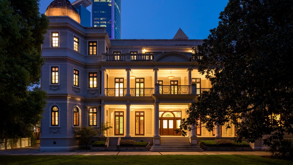 The exterior of Rong Zhai at night.