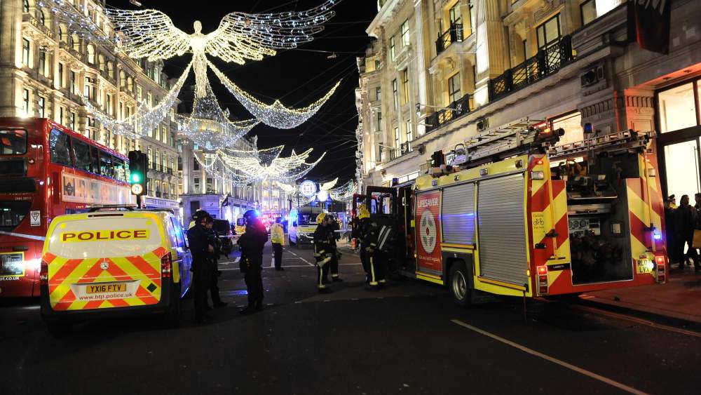 Armed police at Oxford Circus conducting an evacuation after a police incident at Oxford Circus