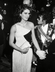 Pop superstar Michael Jackson escorts actress-model Brooke Shields to a party at the Rex restaurant in Los Angeles following the Grammy Awards presentationGrammy Awards, Los Angeles, USA