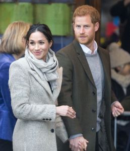 Meghan Markle (in Smythe, Jigsaw and Burberry) and Prince Harry