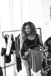 Serena Williams with clothes from her line.