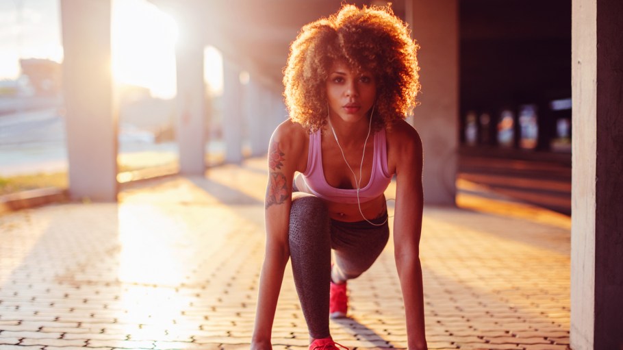 young woman prepared to run