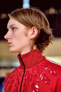A model in a Stella McCartney Men's Spring 2018 look.