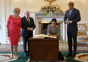 Prince Harry accompanied by his wife Meghan Duchess of Sussex visit the President Michael Higgins and his wife Sabina Coyne at Aras an Uachtarain