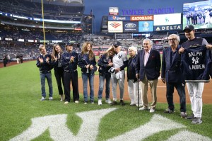 Ralph Lauren throws the opening pitch of the New York Yankees vs Boston Red Sox game in celebration of Ralph Lauren 50th anniversary.