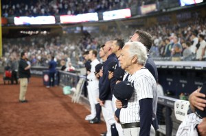Ralph Lauren throws the opening pitch of the New York Yankees vs Boston Red Sox game in celebration of Ralph Lauren 50th anniversary.