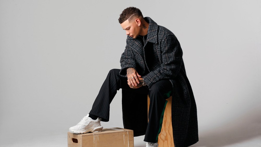 Stella McCartney’s coat, Dunhill’s leather jacket worn as shirt and Off-White’s pants. Valentino sneakers.