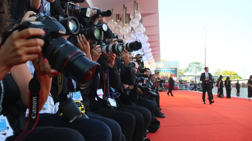 Photographers walk the red carpet ahead of the Award Ceremony during the 75th Venice Film Festival at Sala Grande on September 8, 2018 in Venice, Italy.
