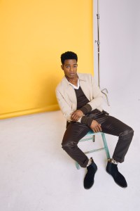 Tom Ford's viscose silk-blend jacket, silk sweater, cotton shirt and linen silk-blend pants.