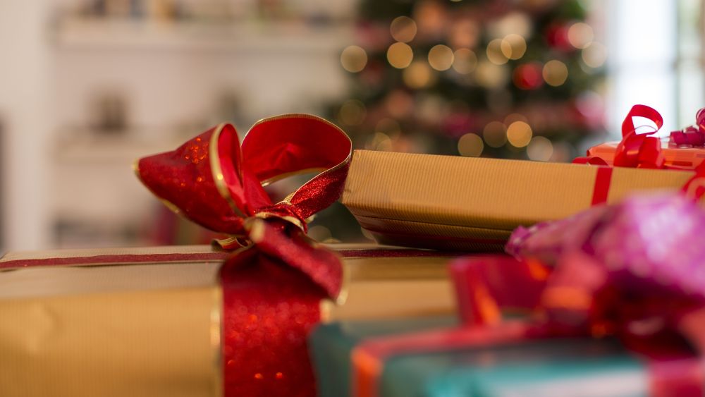 Minimum usage fee is £35Mandatory Credit: Photo by Cultura/REX/Shutterstock (4794771a)Close up of three christmas gifts with ribbonsVARIOUS