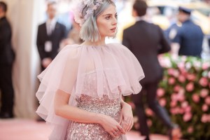 Lucy Boynton in Prada.