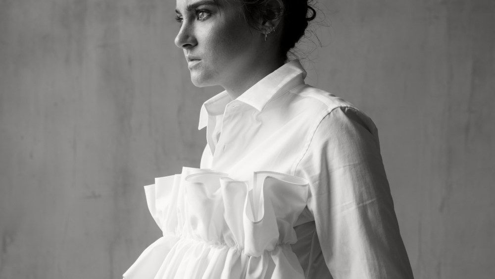 Comme Des GarconsÕ cotton shirt (available at Saks Fifth Avenue); Common OddsÕ polyester, viscose and elastane trouser; Shihara earrings.