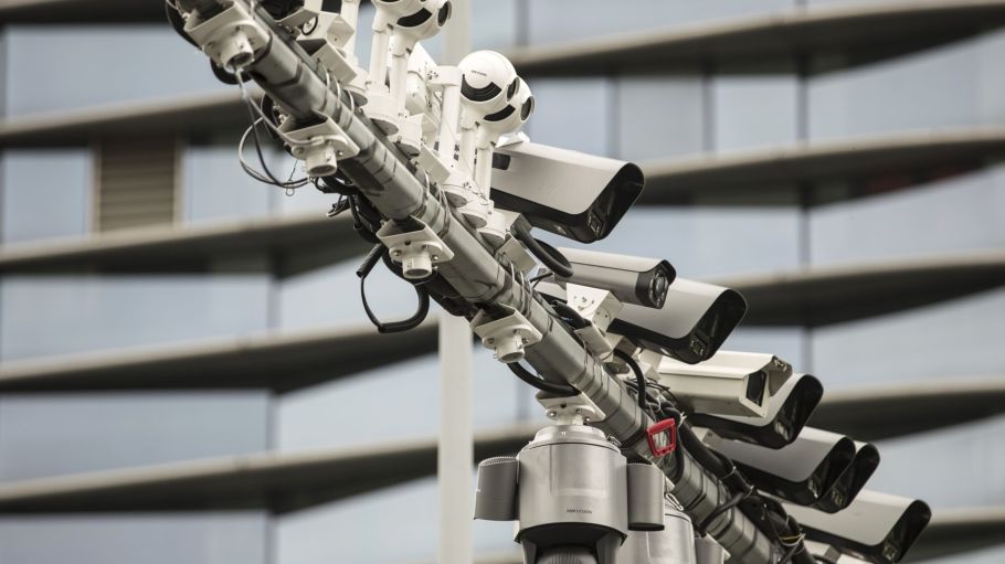 Surveillance cameras fill up a pole at a testing station near the head quarters of the Hangzhou Hikvision Digital Technology Co., Ltd. in Hangzhou, China