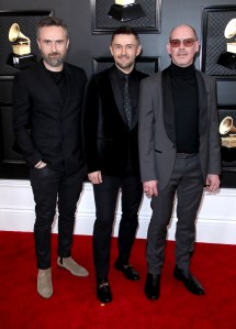 Noel Hogan, Michael Gerard Hogan, and Fergal Lawler of The Cranberries