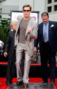 HOLLYWOOD - JUNE 05:  Actor Brad Pitt creates an imprint of their footprints at the Grauman's Chinese Theatre on June 5, 2007 in Hollywood, California.  (Photo by Kevin Winter/Getty Images)