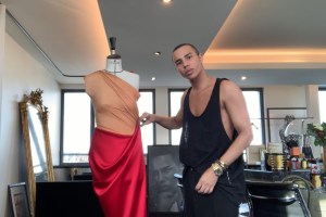 Balmain's Olivier Rousteing draping on a bust form.