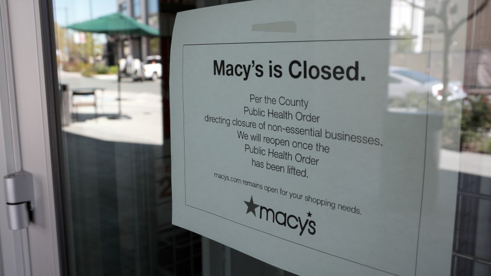 macy's store closed sign windo