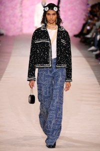 There’s more to decoration than florals, feathers and froth. Giambattista Valli injected a street-savvy note with jacquard logo denim, here worn with a classic tweed jacket.