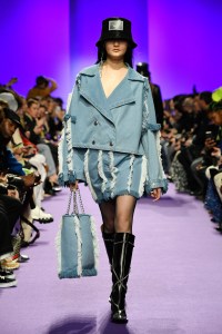 Victoria Feldman and Tomas Berzins worked an Eighties vibe with vertical fringing on a boxy jacket and miniskirt.