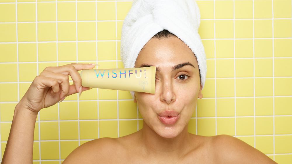 Huda Kattan with Wishful Yo Glow Enzyme Scrub