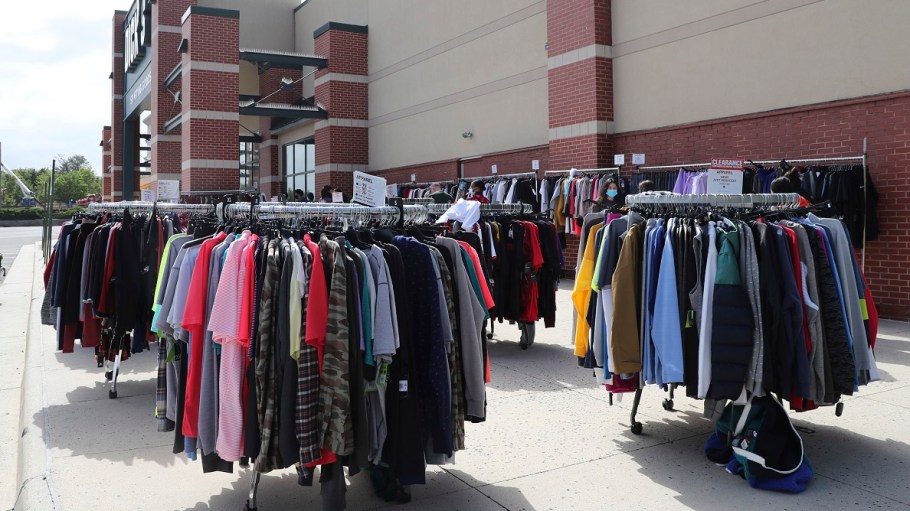 After being closed for two months, a Dick's Sporting Goods store in Virginia moved excess inventory outside upon opening in May so people waiting in line could view the product before entering the store.