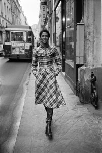 Plaid skirt and matching jacket over a floral blouse by Kenzo's JAP label for RTW Fall 1973.