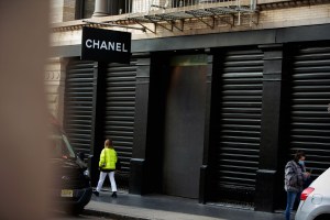Boarded up stores across SoHo in New York .