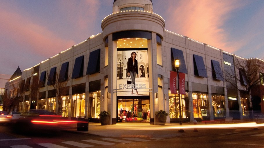 Express cuts 10 percent of corporate jobs in Q3 as the fashion chain posts a wider loss for the quarter and a 34.1 percent sales drop.