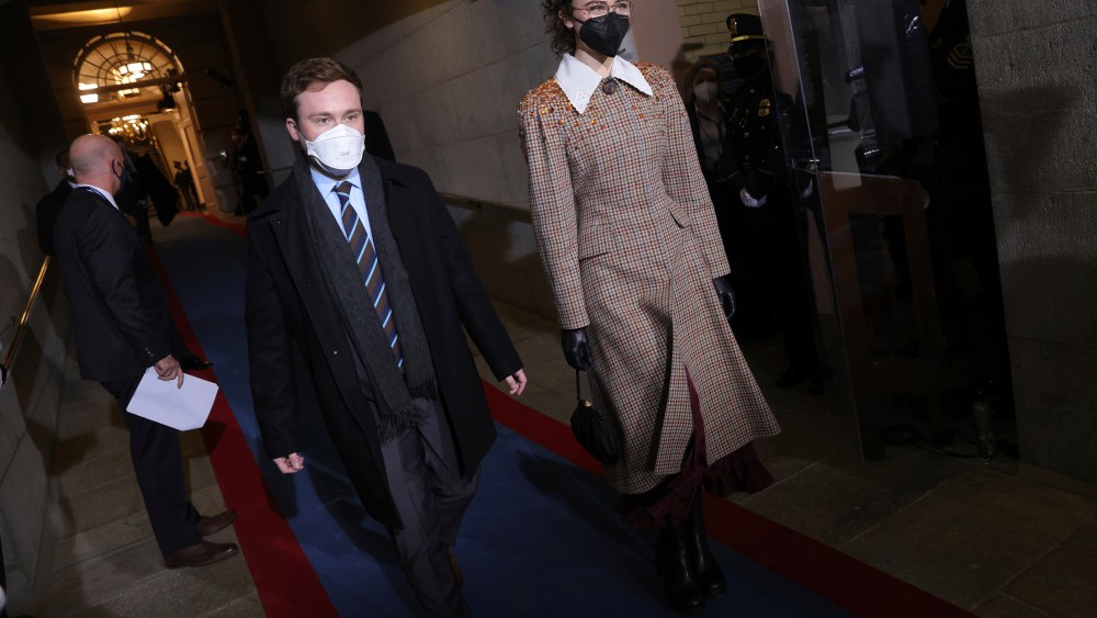 From left, Cole Emhoff and Ella Emhoff, the stepchildren of Vice President-Elect Kamala Harris arrive for the inauguration of President-elect Joe Biden on the West Front of the U.S. Capitol on Wednesday, Jan. 20, 2021 in Washington.  (Win McNamee/Pool Photo via AP)