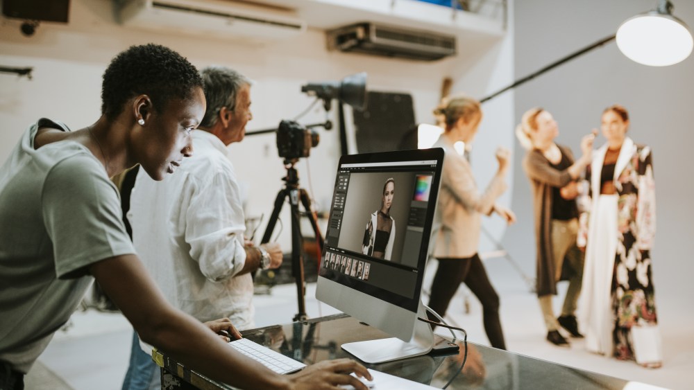 Art director checking photos on a monitor