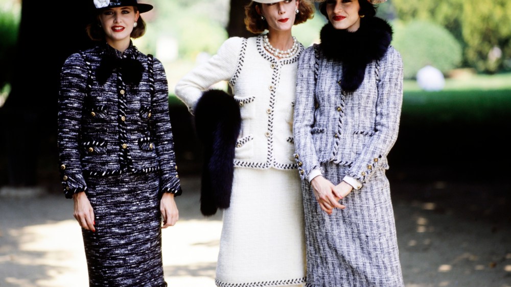 Models pose in looks from Chanel's fall 1983 couture collection advance. Designer Karl Lagerfeld's second couture collection for the House of Chanel.