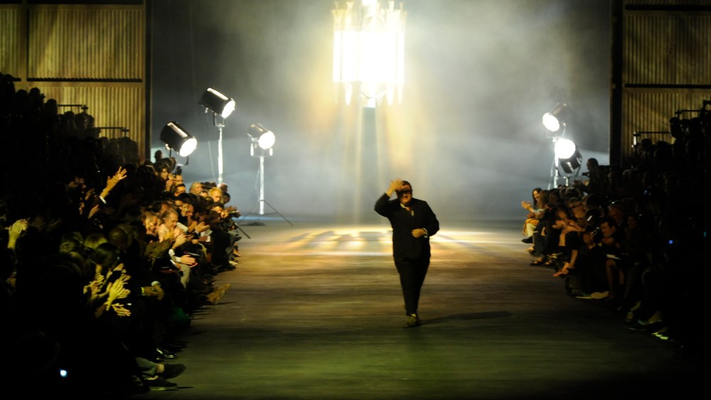 Designer Alber Elbaz on the runway after his Lanvin spring 2010 show at Halle Freyssinet.