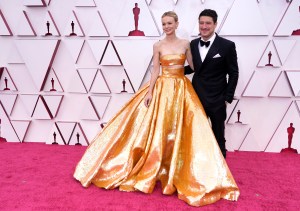 Carey Mulligan, left, and Marcus Mumford arrive at the Oscars on Sunday, April 25, 2021, at Union Station in Los Angeles. (AP Photo/Chris Pizzello, Pool)