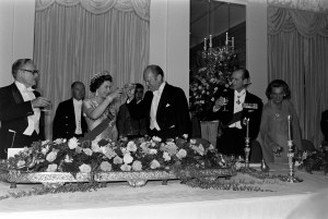(L-R, front row) Nelson Rockefeller, Queen Elizabeth II, Gerald R. Ford, Prince Phillip, and Happy Rockefeller attend a party at the British embassy in Washington, D.C., on July 8, 1976.