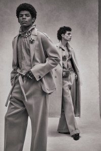 Left: Ermenegildo Zegna XXX’s wool felt suit and high-neck collar silk shirt. Givenchy necklace; RJ Graziano brooch.Right: Mans’ wool and cashmere topcoat worn over Ermenegildo Zegna XXX’s felted wool jacket and pants. Federico Curradi necklaces; Amiri belt bag; Comme des Garçons Homme Plus shoes.