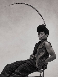 Salvatore Ferragamo’s wool and mohair vest and pants. Joomi Lim earring; East Village Hats structured pillbox hat.