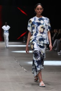 SYDNEY, AUSTRALIA - MAY 31: A model walks the runway during the Bassike Resort 2022 show during Afterpay Australian Fashion Week 2021 Resort '22 Collections at The Venue Alexandria on May 31, 2021 in Sydney, Australia. (Photo by Brendon Thorne/Getty Images)