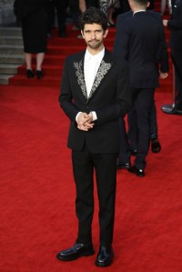 Ben Whishaw poses for photographers upon arrival for the World premiere of the new film from the James Bond franchise 'No Time To Die', in London Tuesday, Sept. 28, 2021. (Photo by Vianney Le Caer/Invision/AP)