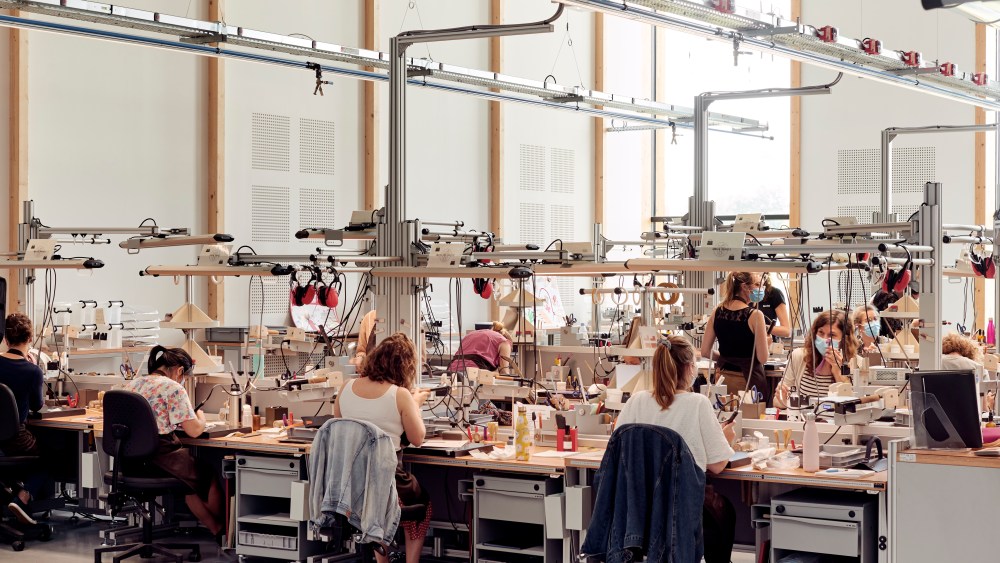 Artisans at the Hermès leather goods workshop in Saint-Vincent-de-Paul, France.